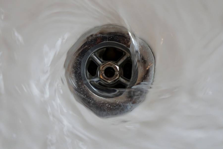 Getting rid of thick black gunk in the sink drain